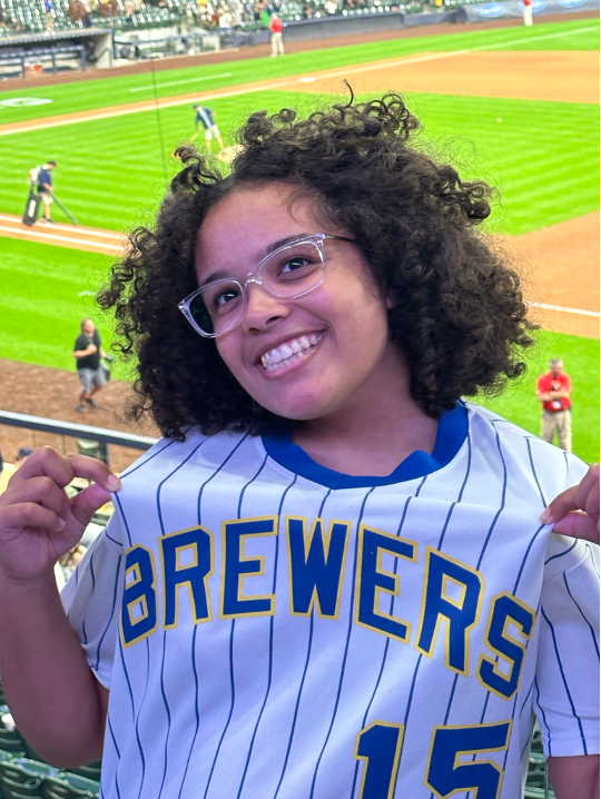 2024 Diversity in Conservation Internship cohort member at a brewers baseball game