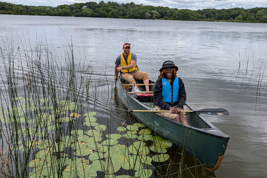 Two people in a canoe on Lulu Lake