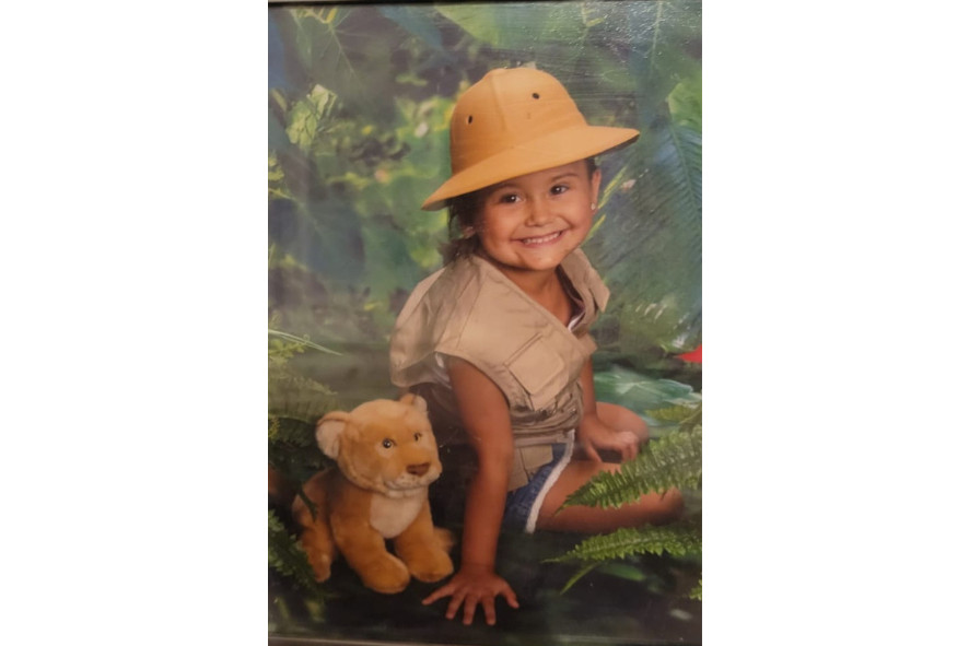 A young Arianna dressed up as a zoologist. 