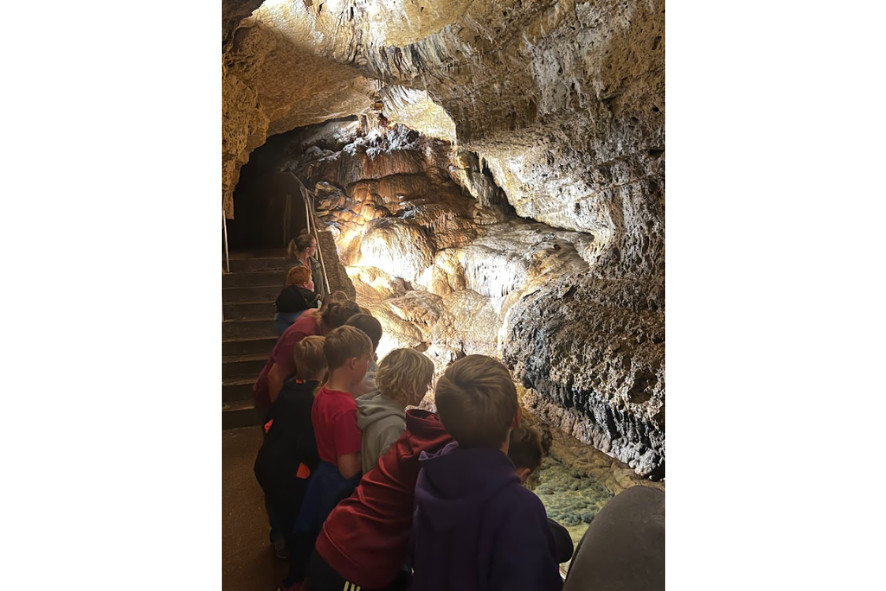 Students on a tour of Cave of the Mounds learn about underground rock formations, a 2024 conservation highlight