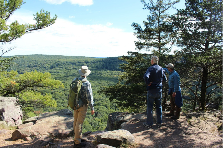 People standing on a rocky overlook at South Bluff/Devil's Nose SNA