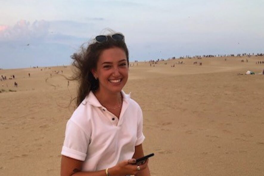 Person standing in vast expanse of sand at Jockey's Ridge In North Carolina